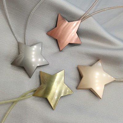 calidad Hebilla del atascamiento de la cortina del imán de la estrella del metal de los accesorios de la pista de la cortina del comedor fábrica